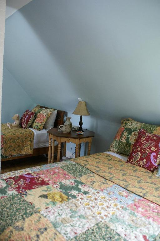 Room with Queen Bed and Double Bed